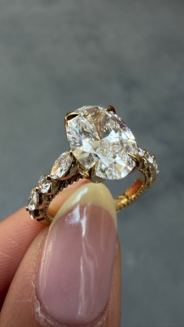 A new oval engagement ring has entered the chat…. 💍💍

2.55 carat oval cut diamond in a 14K yellow gold setting with marquise and round brilliant cut diamonds on the band 💎💎💎

Style number: 5036274