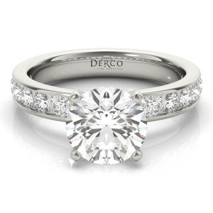 14K White Gold Channel Set Engagement Ring with 0.79 Carat Pear Diamond 14K White Gold Channel Set Engagement Ring with 0.79 Carat Pear Diamond