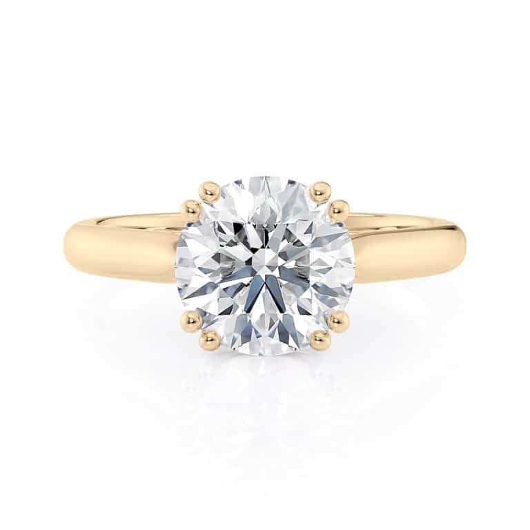 14k yellow gold double prong basket engagement ring with 14k yellow gold metal and round shape diamond