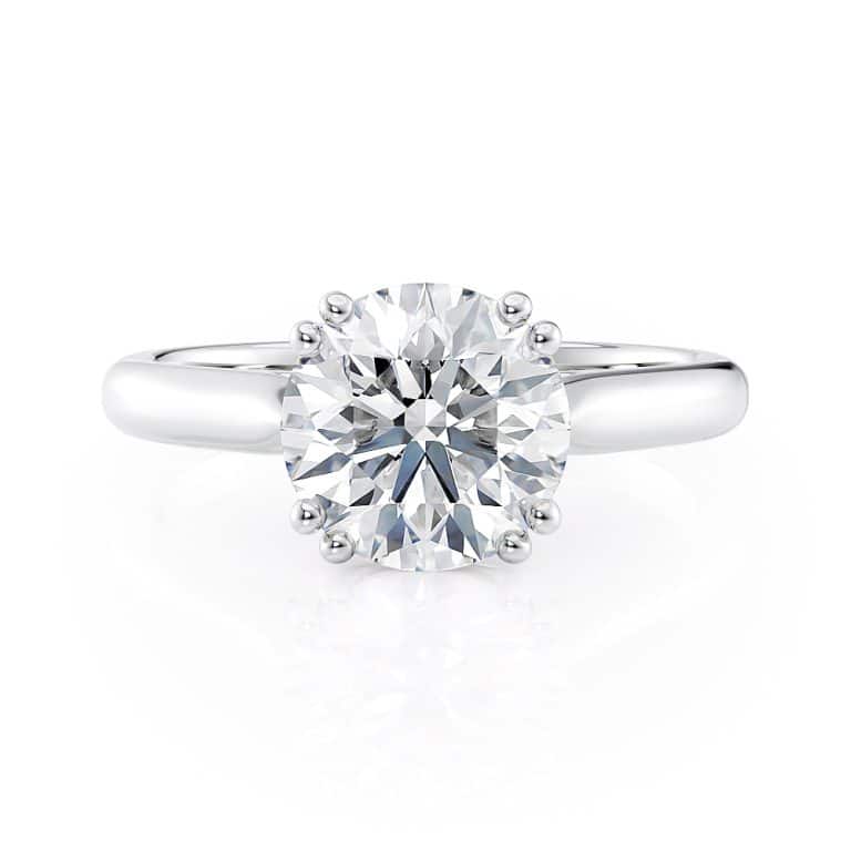 platinum double prong basket engagement ring with platinum metal and round shape diamond