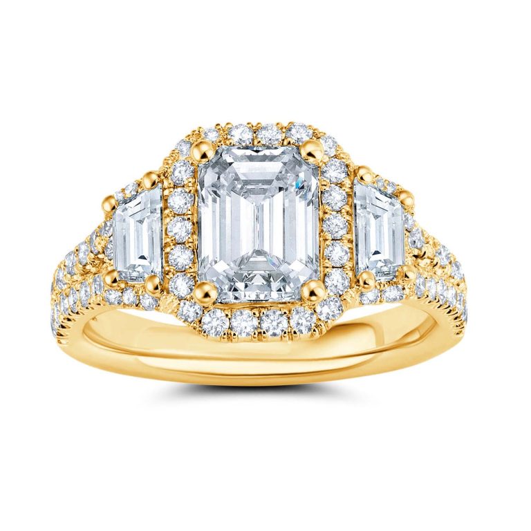 14k yellow gold emerald halo trapezoid diamond engagement ring with 14k yellow gold metal and emerald shape diamond