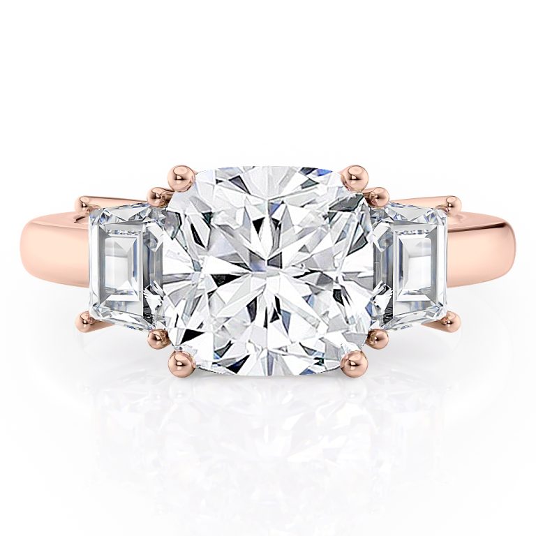 14k rose gold three stone step cut trapezoid diamond ring with 14k rose gold metal and cushion shape diamond
