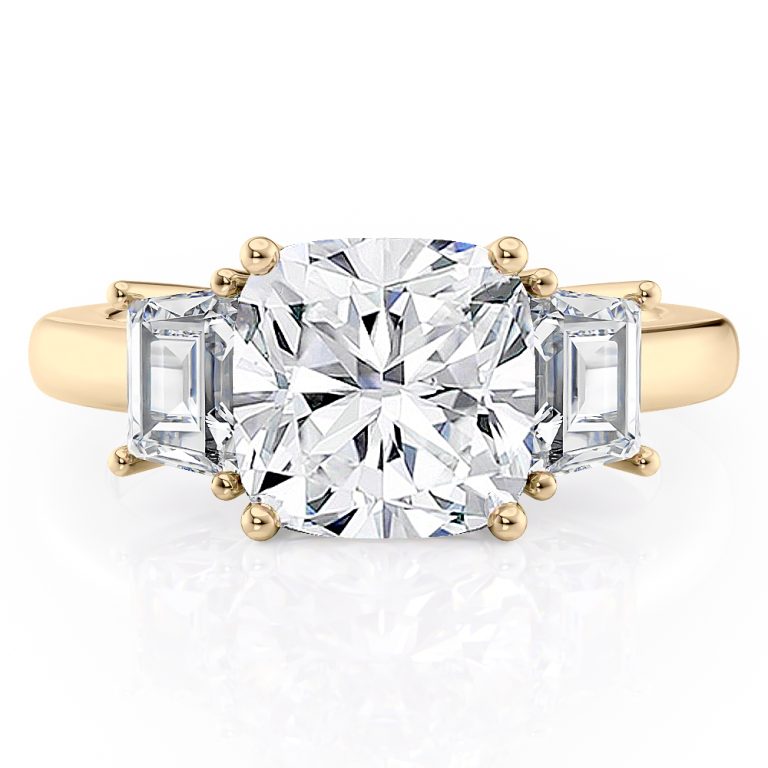 18k yellow gold three stone step cut trapezoid diamond ring with 18k yellow gold metal and cushion shape diamond