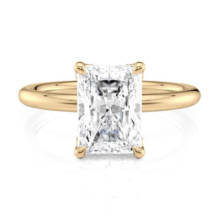 18k yellow gold curved hidden halo radiant solitaire engagement ring with 18k yellow gold metal and radiant shape diamond