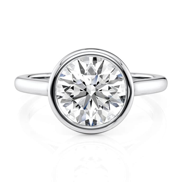 14k white gold round bezel solitaire with 14k white gold metal and round shape diamond