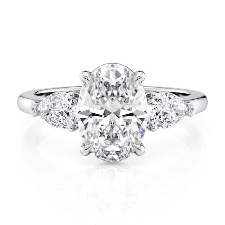 14k white gold three stone pear diamonds flush fit engagement ring (0.50 ctw) with 14k white gold metal and oval shape diamond