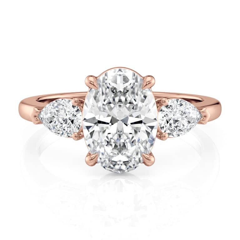 14k rose gold three stone pear diamonds flush fit engagement ring (0.50 ctw) with 14k rose gold metal and oval shape diamond