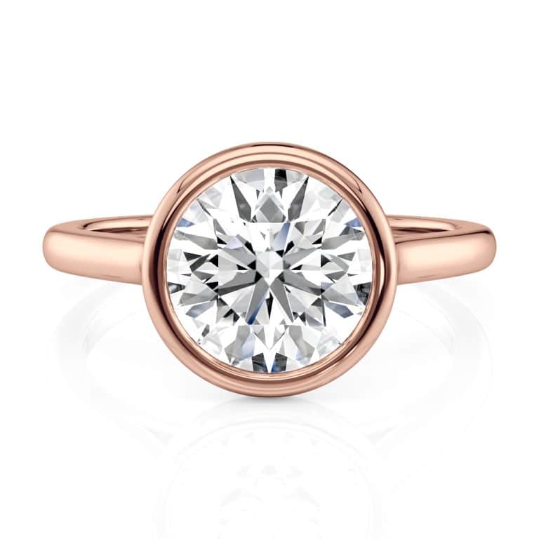 14k rose gold round bezel solitaire with 14k rose gold metal and round shape diamond