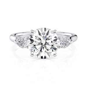 Platinum Round and Pear Flush Fit Three Stone