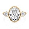 14k yellow gold natural three stone bezel set with pears with oval shape diamond