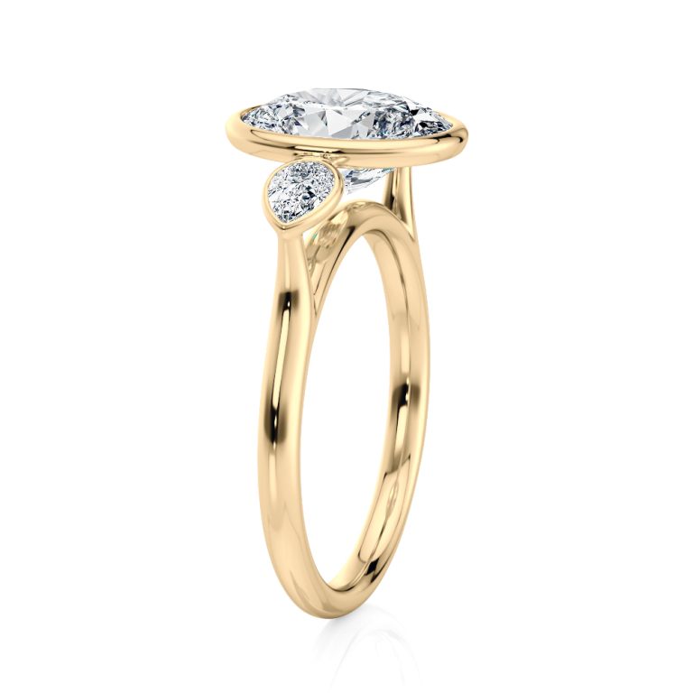 14k yellow gold natural three stone bezel set with pears with oval shape diamond