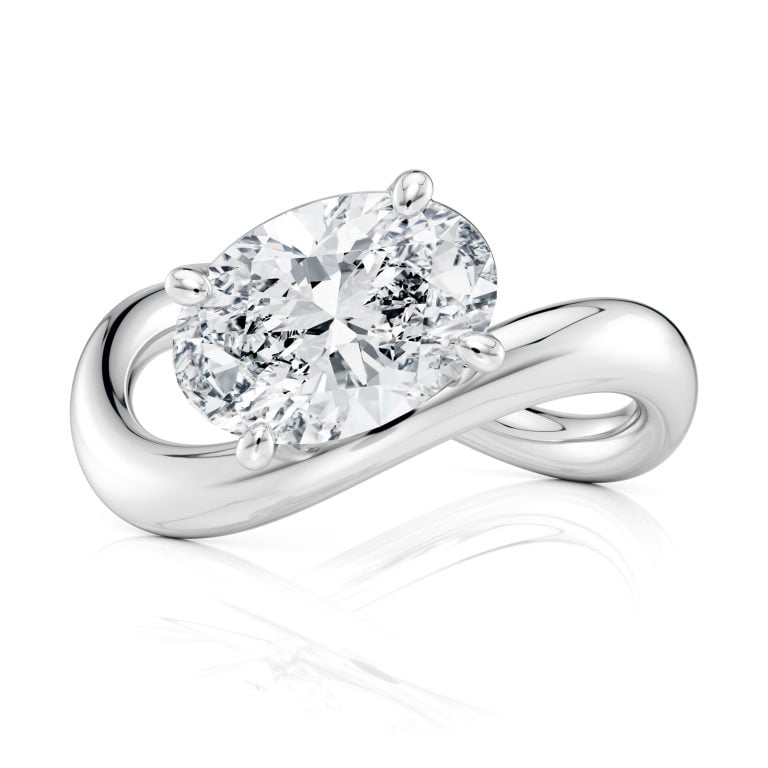 14k white gold oval flow bypass ring with oval shape diamond