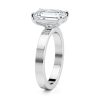 14k white gold solitaire cigar band with emerald shape diamond