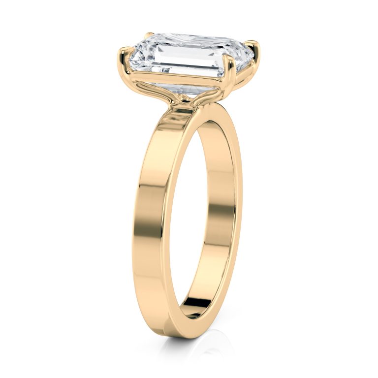 14k yellow gold solitaire cigar band with emerald shape diamond