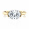 18k yellow gold east-west half bezel solitaire engagement ring with oval shape diamond