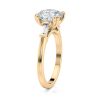 14k yellow cathedral baguette lab diamond engagement ring with round shape diamond