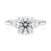 18k white gold three stone pear lab diamond engagement ring-sits flush with a wedding band with round shape diamond