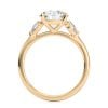14k yellow gold three stone pear lab diamond engagement ring-sits flush with a wedding band with round shape diamond