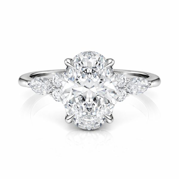 Platinum Oval Engagement Ring With Marquise & Round Cluster