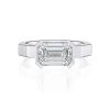 18k white gold e.w. geometric half bezel emerald solitaire engagement ring with emerald shape diamond