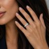 18k white gold e.w. geometric half bezel emerald solitaire engagement ring with emerald shape diamond