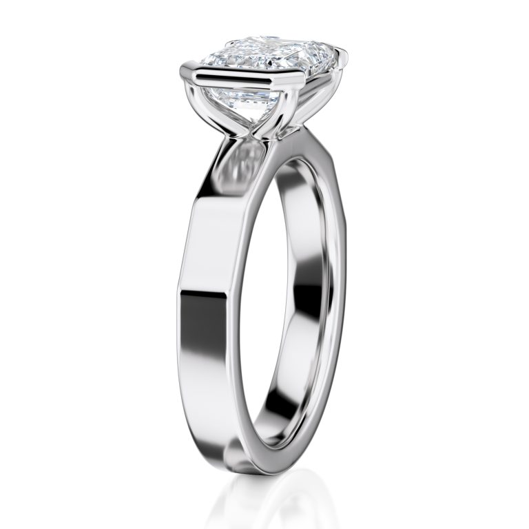 18k white gold e.w. geometric half bezel emerald solitaire engagement ring with emerald shape diamond