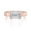 14k rose gold e.w. geometric half bezel emerald solitaire engagement ring with emerald shape diamond