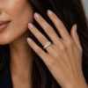 14k yellow gold e.w. geometric half bezel emerald solitaire engagement ring with emerald shape diamond