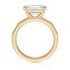 14k yellow gold e.w. geometric half bezel emerald solitaire engagement ring with emerald shape diamond