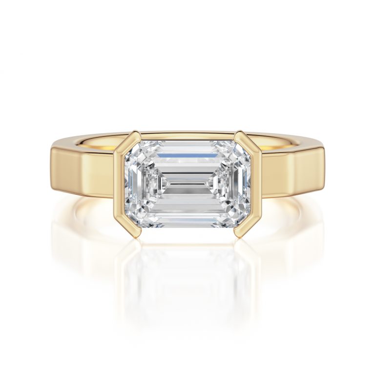 14k yellow gold e.w. geometric half bezel emerald solitaire engagement ring with emerald shape diamond